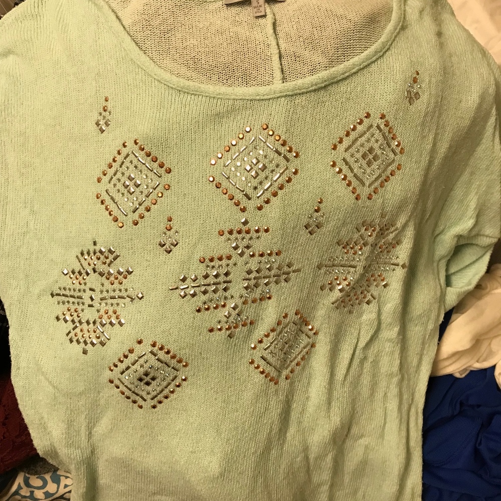 Random shirts and pair of american eagle pants